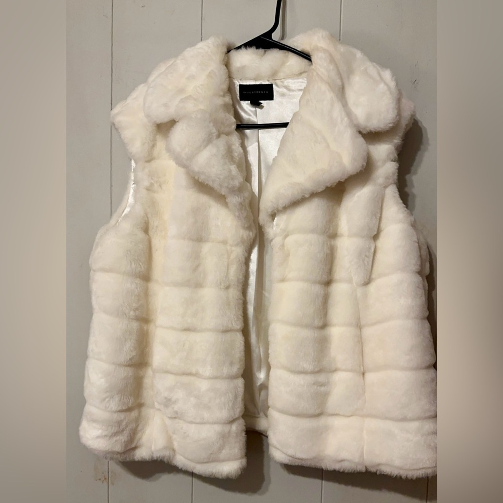 White fur vest